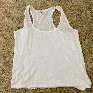 Vici white tank.” Size M fits more like a small.